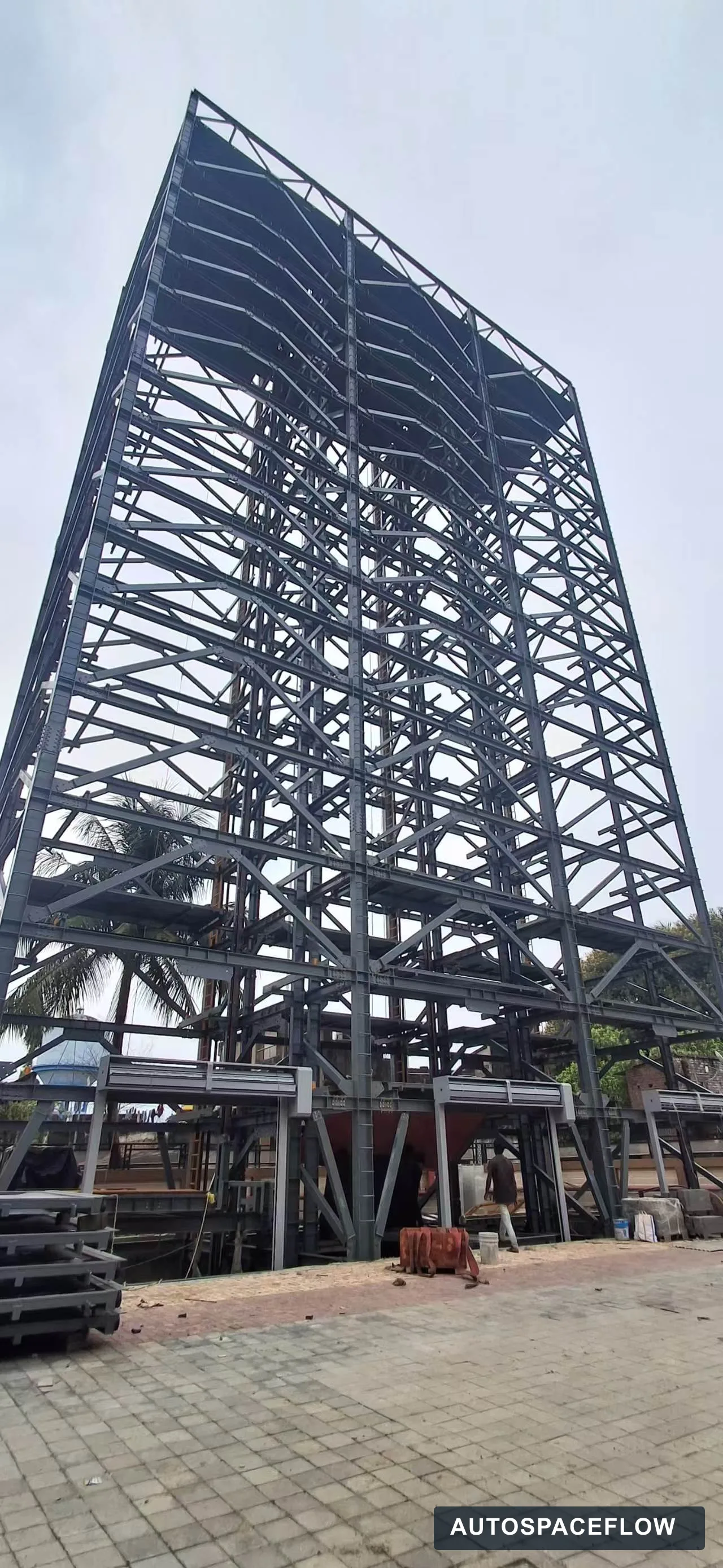 Steel structure of a 220-space pallet tower parking project under installation in an Indian town center