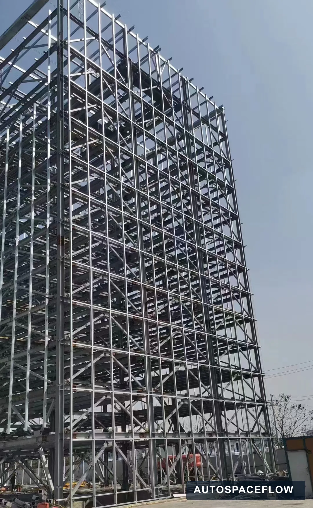 Ten-level pallet tower parking structure under installation for a 100-car project in Romania