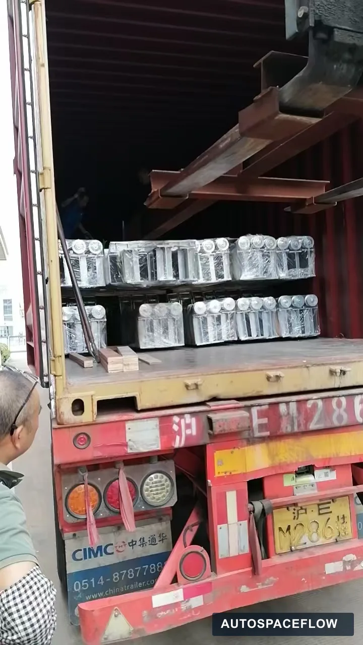 Wrapped drive and structural components secured inside a container for the Vietnam puzzle parking project